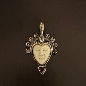 Silver and Cream Face Pendant Necklace